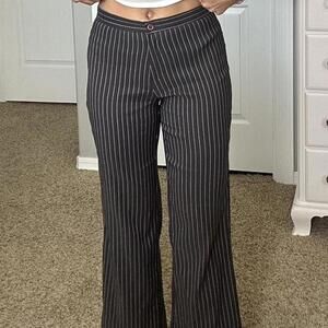 Grey and white pinstripe flare pants with a touch of retro style